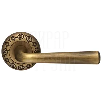 Дверная ручка Extreza 'SANDRO' (Сандро) 332 на круглой розетке R04 матовая бронза