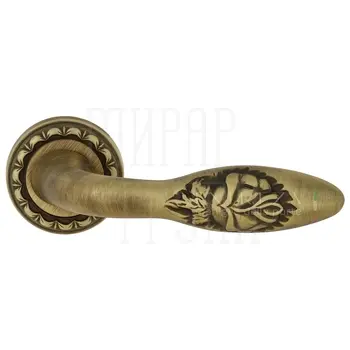 Дверная ручка Extreza 'Mirel-R' на круглой розетке R02 матовая бронза