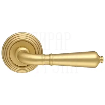 Дверная ручка Extreza 'Petra' (Петра) 304 на круглой розетке R05 матовое золото