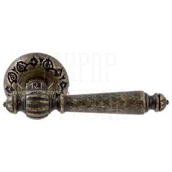 Дверная ручка Extreza 'Daniel' (Даниел) 308 на круглой розетке R04 античная бронза