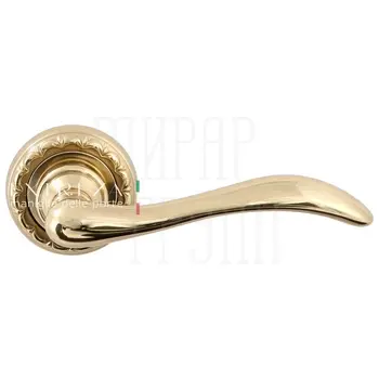 Дверная ручка Extreza 'Agata' (Агата) 310 на круглой розетке R02 латунь