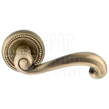 Дверная ручка Extreza 'Berta' (Берта) 312 на круглой розетке R03 матовая бронза