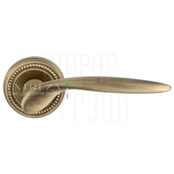 Дверная ручка Extreza 'Calipso' (Калипсо) 311 на круглой розетке R03 матовая бронза