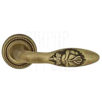Дверная ручка Extreza 'Mirel-R' на круглой розетке R03 матовая бронза