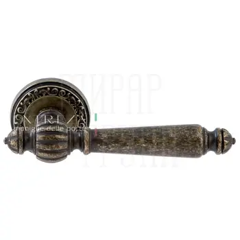 Дверная ручка Extreza 'Daniel' (Даниел) 308 на круглой розетке R06 античная бронза