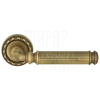 Дверная ручка Extreza 'Benito' (Бенито) 307 на круглой розетке R02 матовая бронза