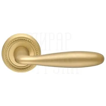 Дверная ручка Extreza 'Vigo' (Виго) 324 на круглой розетке R03 матовое золото