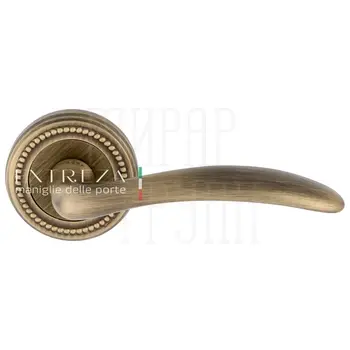 Дверная ручка Extreza 'Simona' (Симона) 314 на круглой розетке R03 матовая бронза