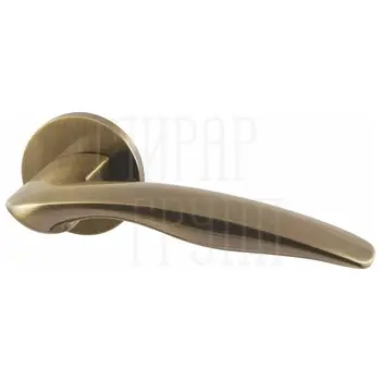 Дверная ручка Armadillo на круглой розетке 'Wave' URS бронза