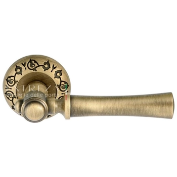 Дверная ручка Extreza 'DEZI' (Дези) 309 на круглой розетке R04 матовая бронза