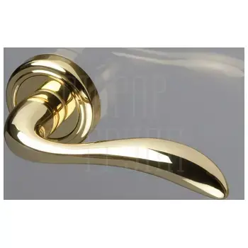 Дверная ручка Extreza 'FLEXA' (Флекса) 335 на круглой розетке R01 латунь