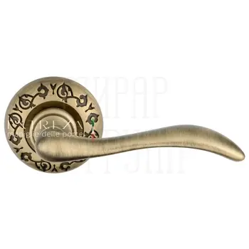 Дверная ручка Extreza 'Agata' (Агата) 310 на круглой розетке R04 матовая бронза