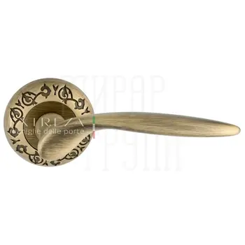 Дверная ручка Extreza 'Calipso' (Калипсо) 311 на круглой розетке R04 матовая бронза