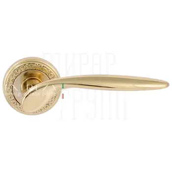 Дверная ручка Extreza 'Calipso' (Калипсо) 311 на круглой розетке R06 полированная латунь