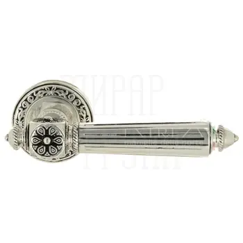 Дверная ручка Extreza 'Leon' (Леон) 303 на круглой розетке R06 серебро+черный