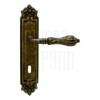 Дверная ручка на планке Melodia 229/229 'Libra' античная бронза (key)