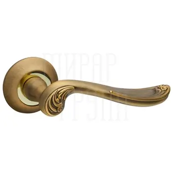 Дверная ручка на круглой розетке Fuaro (Фуаро) 'ART' TL бронза + золото