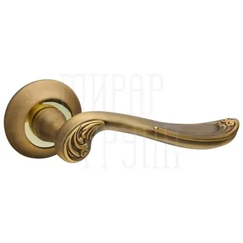 Дверная ручка на круглой розетке Fuaro (Фуаро) 'ART' TL бронза + золото