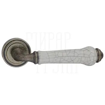 Дверные ручки Renz (Ренц) 'Сиракузы' INDH 617-16 на круглой розетке бронза состаренная/состаренная керамика