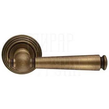 Дверная ручка Extreza 'Annet' (Аннет) 329 на круглой розетке R05 матовая бронза