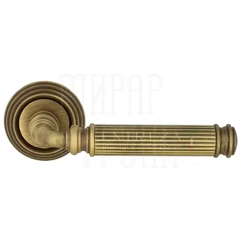 Дверная ручка Extreza 'Benito' (Бенито) 307 на круглой розетке R05 матовая бронза