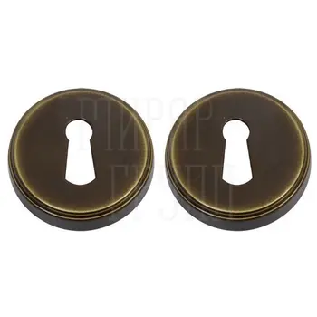 Накладки на круглой розетке под кабинетный ключ Colombo CD1003 BB (Piuma) матовая бронза