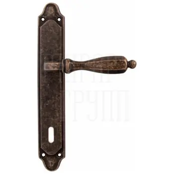 Дверная ручка на планке Melodia 298/158 'Camilla' античная бронза (key)