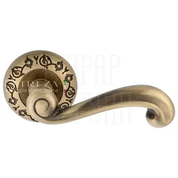 Дверная ручка Extreza 'Berta' (Берта) 312 на круглой розетке R04 матовая бронза