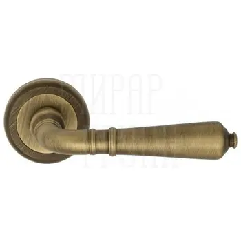 Дверная ручка на круглой розетке Venezia 'VIGNOLE' D1 матовая бронза