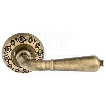 Дверная ручка Extreza 'Petra' (Петра) 304 на круглой розетке R04 матовая бронза
