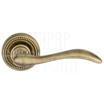 Дверная ручка Extreza 'Agata' (Агата) 310 на круглой розетке R03 матовая бронза