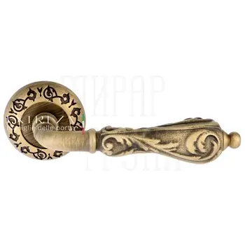 Дверная ручка Extreza 'Greta' (Грета) 302 на круглой розетке R04 матовая бронза