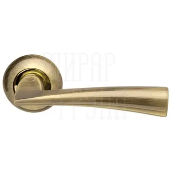 Дверная ручка Armadillo на круглой розетке 'Columba' LD80 бронза + золото