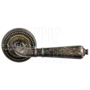 Дверная ручка Extreza 'Petra' (Петра) 304 на круглой розетке R03 античная бронза