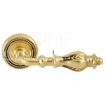 Дверная ручка Extreza 'Evita' (Эвита) 301 на круглой розетке R03 французское золото