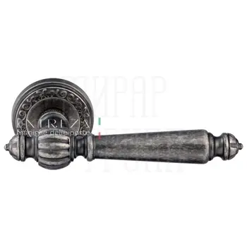 Дверная ручка Extreza 'Daniel' (Даниел) 308 на круглой розетке R06 античное серебро