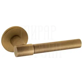 Дверная ручка Fratelli 'UNA' 7 FS на круглой розетке матовая бронза