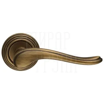 Дверная ручка Extreza 'ARIANA' (Ариана) 333 на круглой розетке R05 матовая бронза