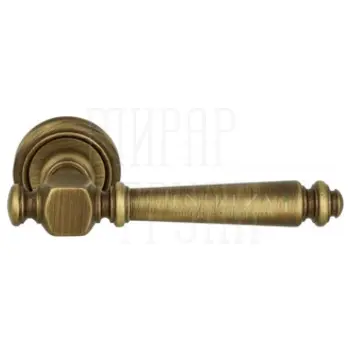 Дверная ручка Extreza 'Veronika' (Вероника) 325 на круглой розетке R01 матовая бронза