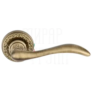 Дверная ручка Extreza 'Agata' (Агата) 310 на круглой розетке R06 матовая бронза
