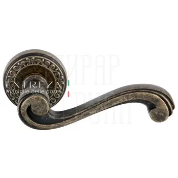 Дверная ручка Extreza 'Lina' (Лина) 313 на круглой розетке R06 античная бронза