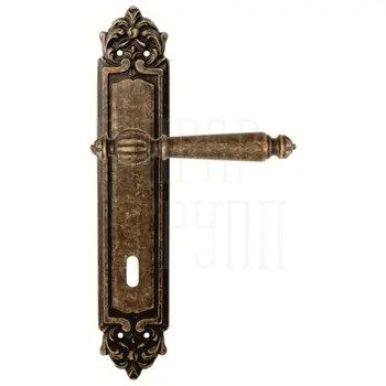 Дверная ручка на планке Melodia 235/229 'Mirella' античная бронза (key)