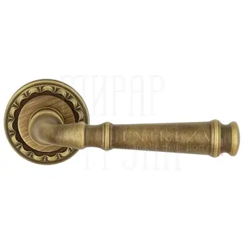 Дверная ручка Extreza 'Bono' (Боно) 328 на круглой розетке R02 матовая бронза
