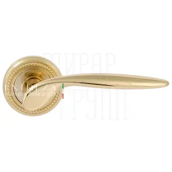 Дверная ручка Extreza 'Calipso' (Калипсо) 311 на круглой розетке R03 полированная латунь
