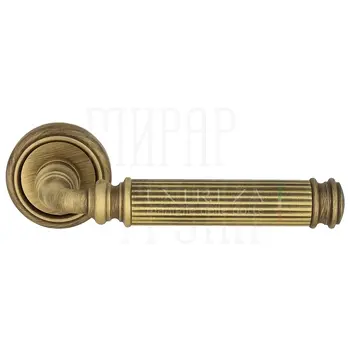 Дверная ручка Extreza 'Benito' (Бенито) 307 на круглой розетке R01 матовая бронза